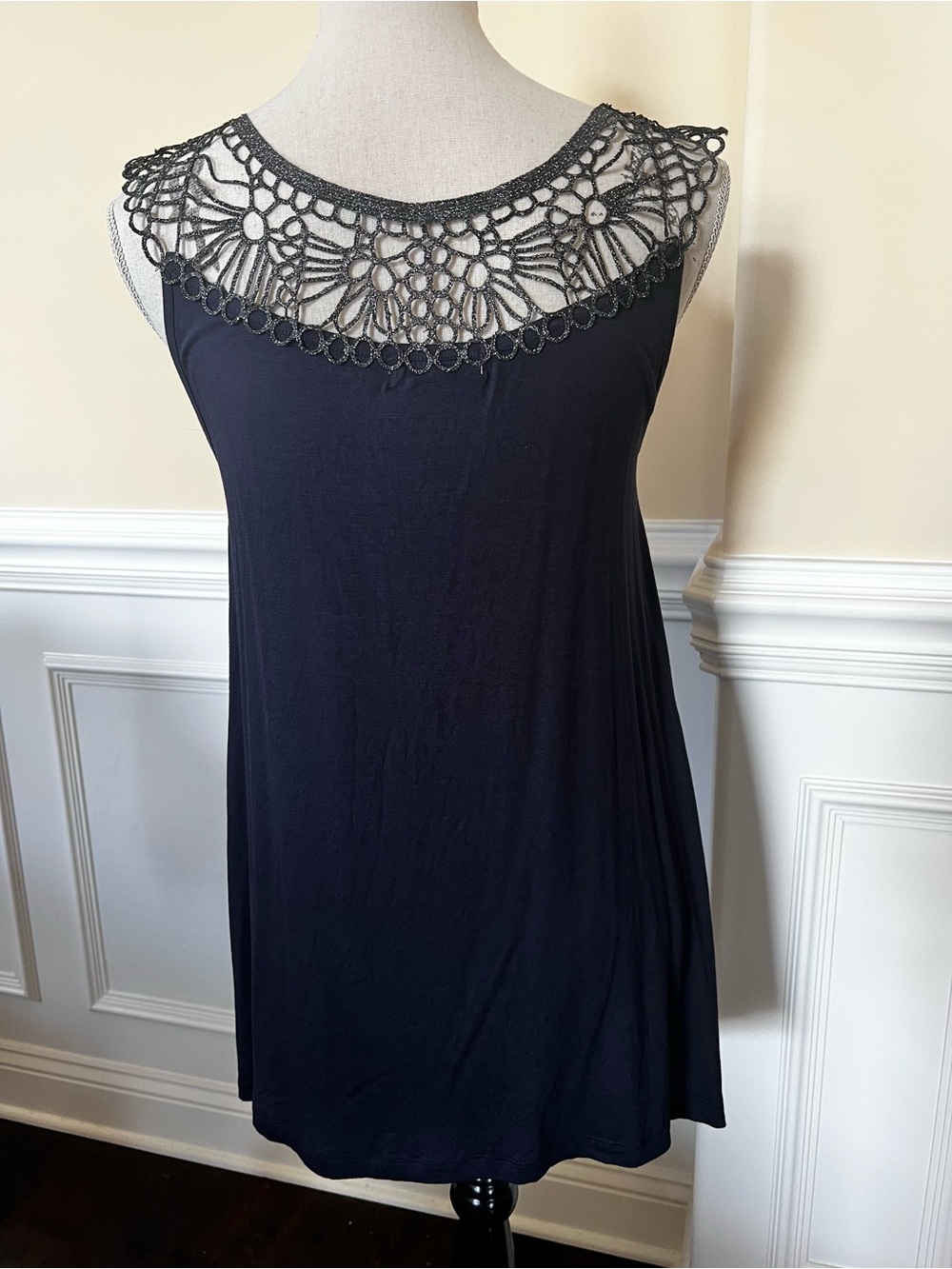 Metallic crochet Lace Neckline. Navy Sleeveless Knit High/Low Asymmetric Tunic.